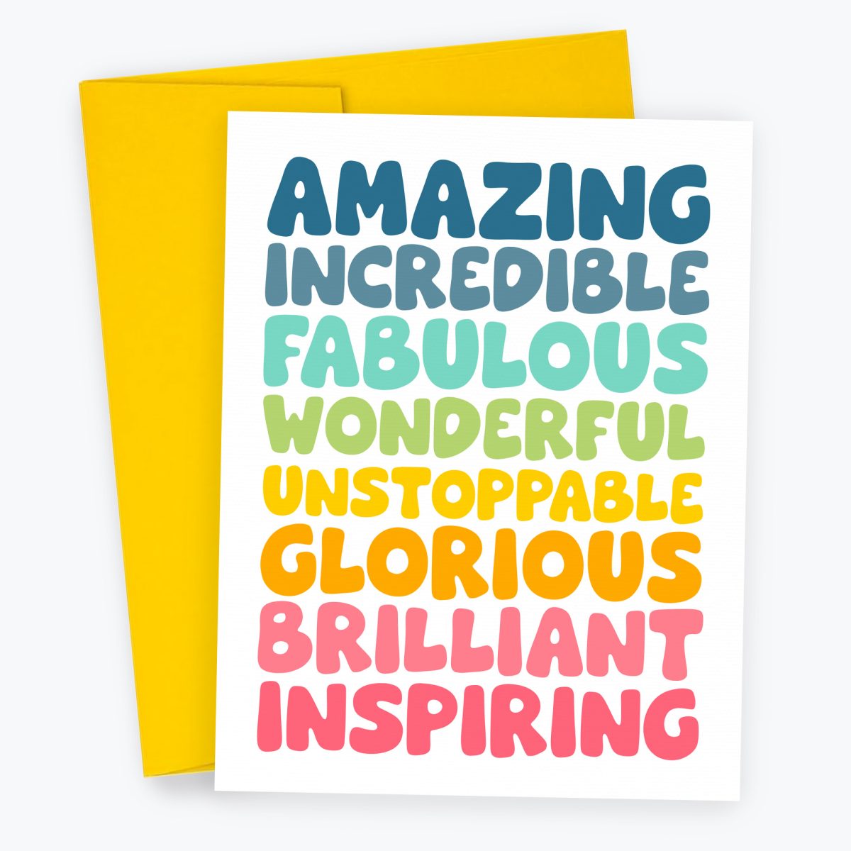 Bold, Colorful Card with positive words to describe someone. Words say "Amazing, incredible, fabulous, wonderful, unstoppable, glorious, brilliant, inspiring" in multicolored text. Includes a yellow envelope.